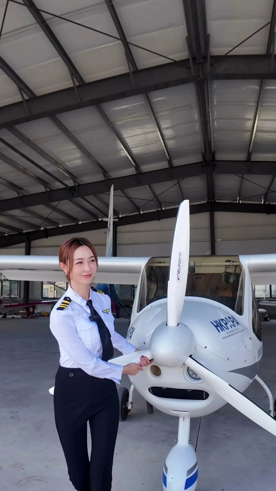 Carmaney beside the aircraft · 00:25