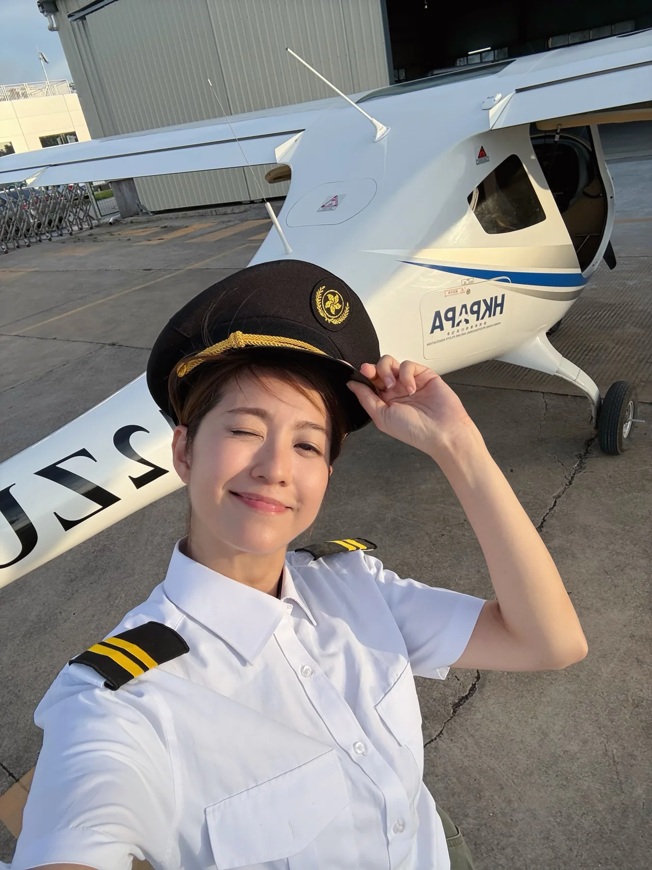 “Captain Yo” beside the HKPAPA aircraft