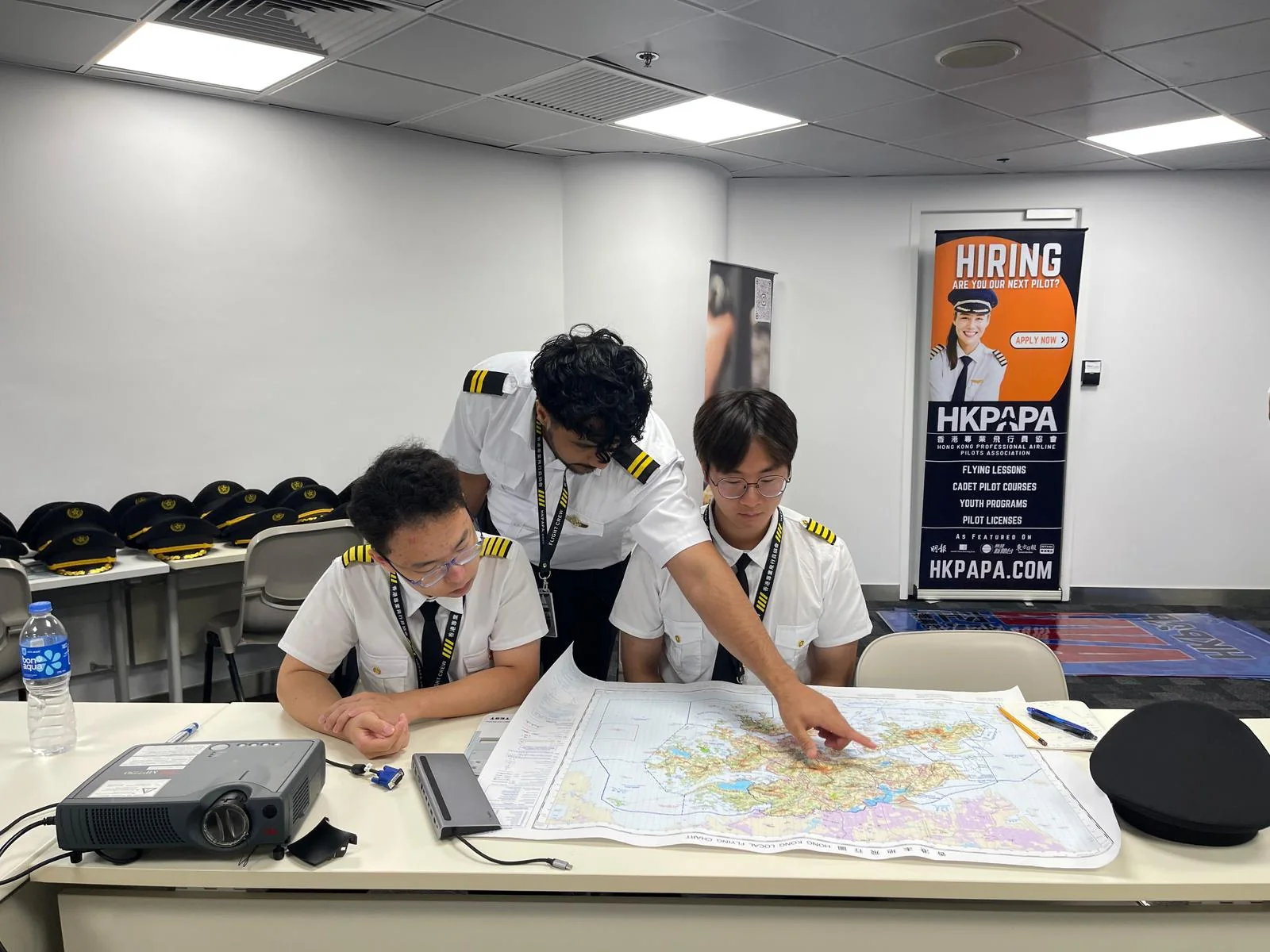 HKPAPA students preparing a flight plan